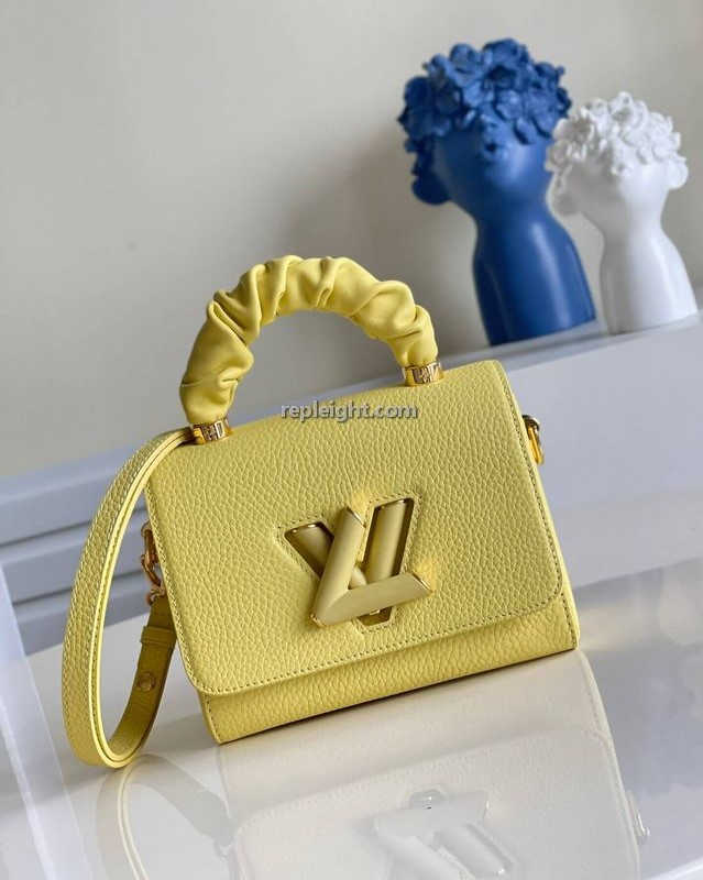 LOUIS VUITTON-M58571 루이비통 진저 옐로우 토뤼옹 가죽 트위스트 PM