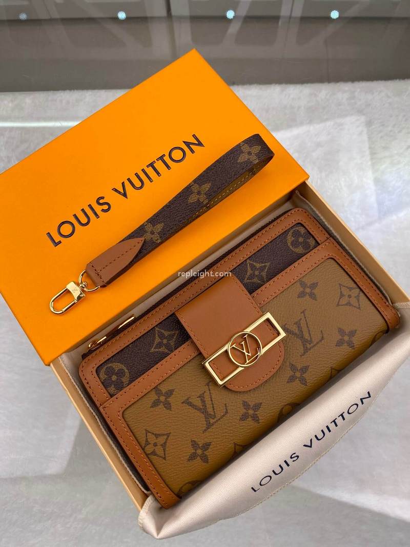 LOUIS VUITTON-M69162 루이비통 모노그램 리버스 도핀 지피 롱 월릿